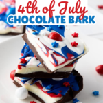A stack of easy red white and blue chocolate bark made with layers of milk and white chocolate swirled with patriotic colors, topped with star sprinkles and candy on a white plate, with overlay text that reads “how to make 4th of july chocolate bark”